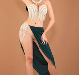 Two-piece dance suit - made of lycra butter - open on one side with strings of pearls - with pearl embroidery on the chest