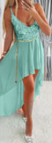 Chiffon dress with fish scales from the chest - short in the front and long in the back - with a metal chain around the middle